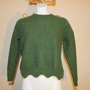 Green turtleneck sweater